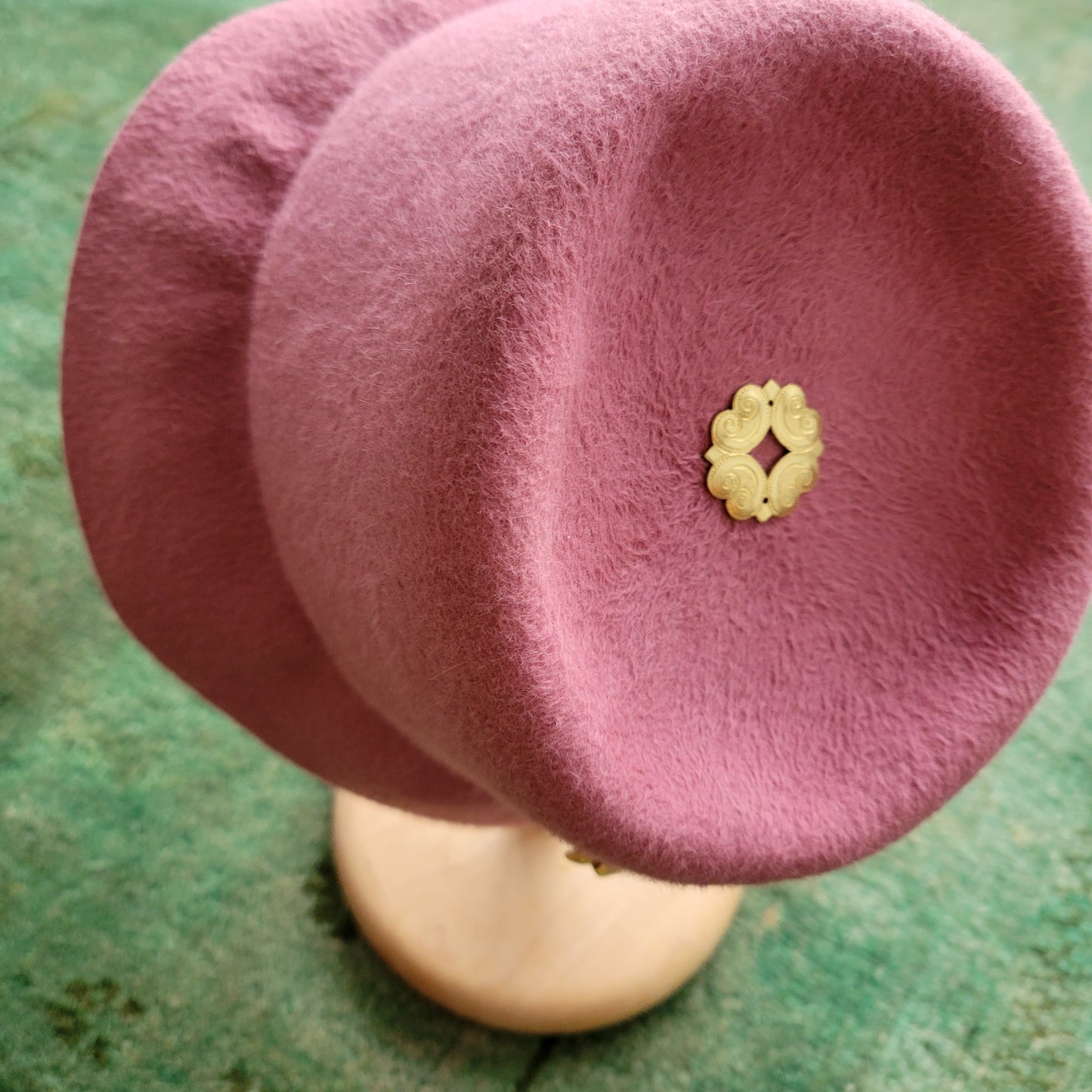 The Oliver with one-of-its-kind brooch