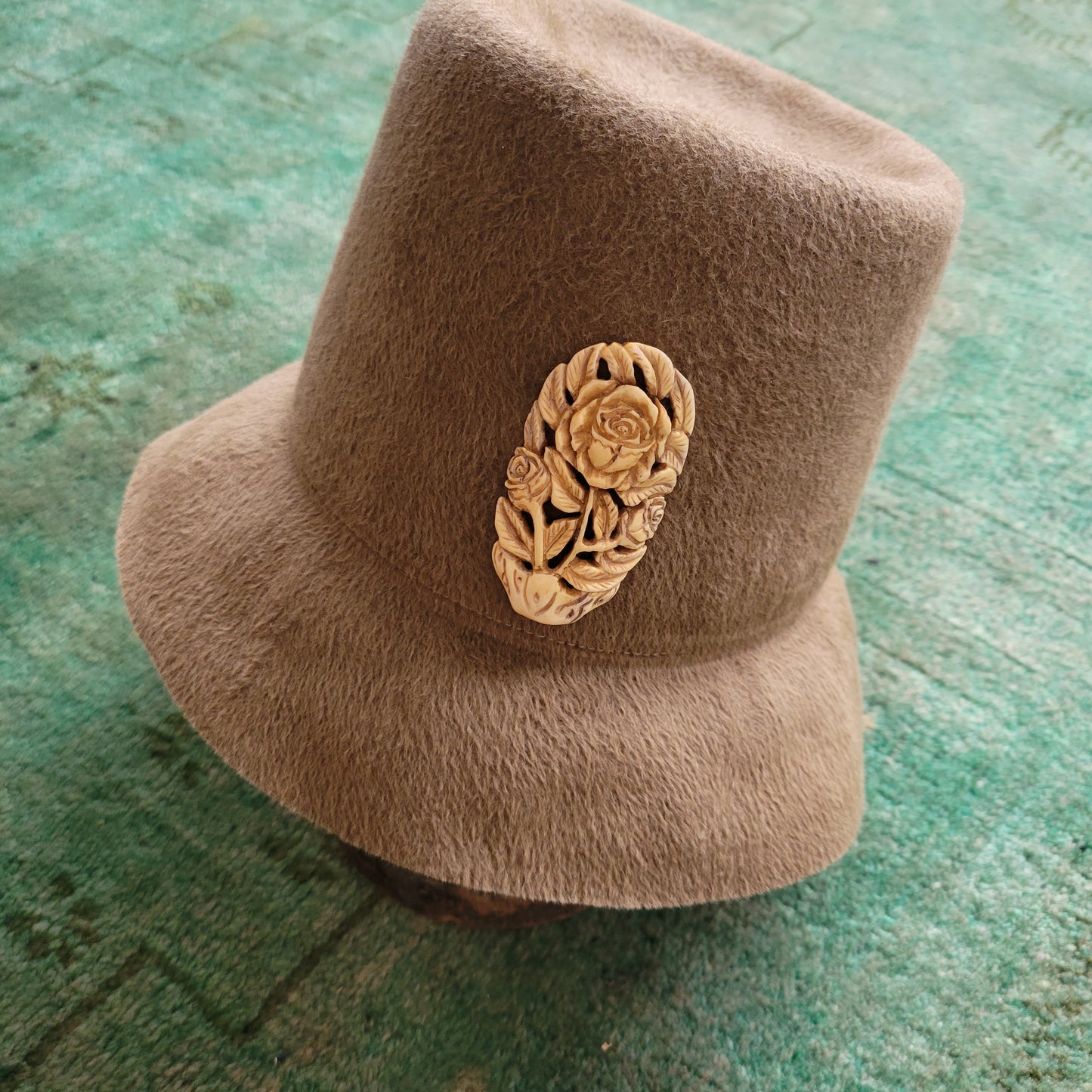 The Oliver with one-of-its-kind brooch