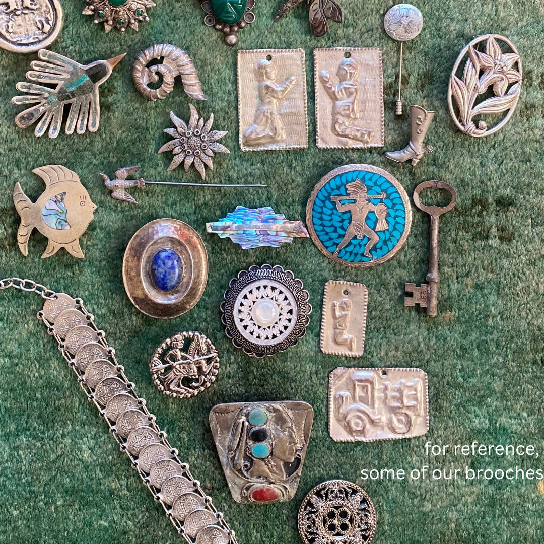 The Oliver with one-of-its-kind brooch