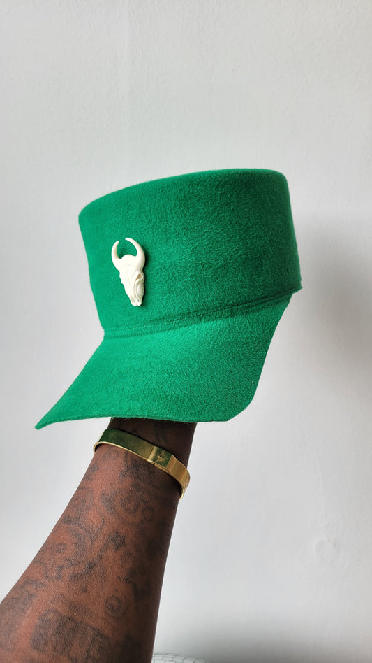 The Rhea Cap in grass green